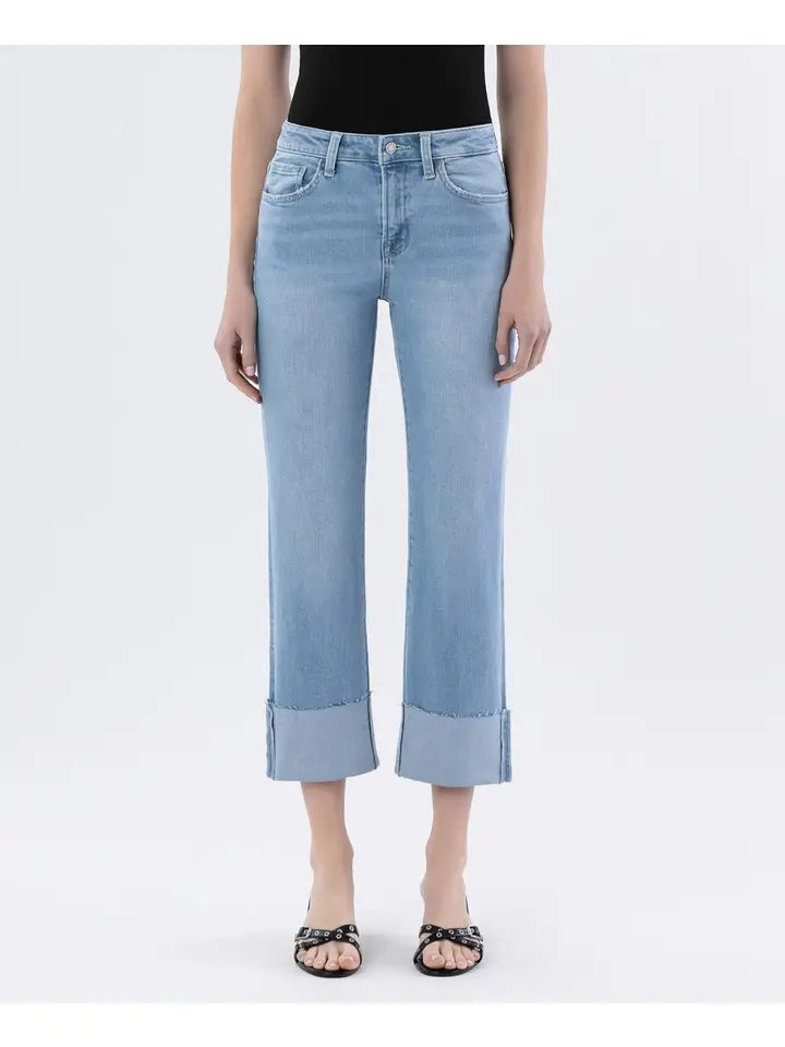 Light blue jeans with a flattering high-rise waist, relaxed straight leg fit, and an easy cuffed hem for laid-back polish.