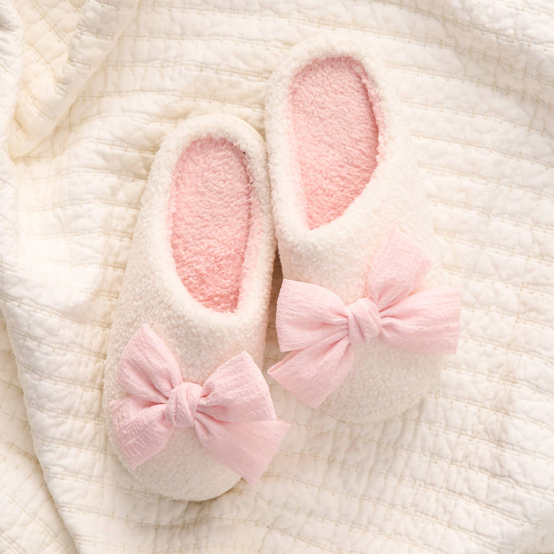 Pink bow slippers