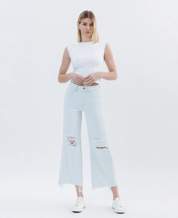 High rise waist light denim jeans with rips under knee