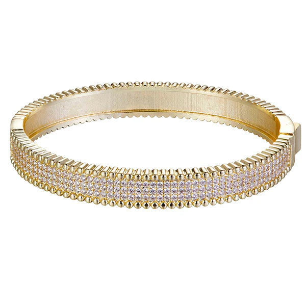 bangle features a push lock design and is constructed with CZ stones arranged in a channel setting