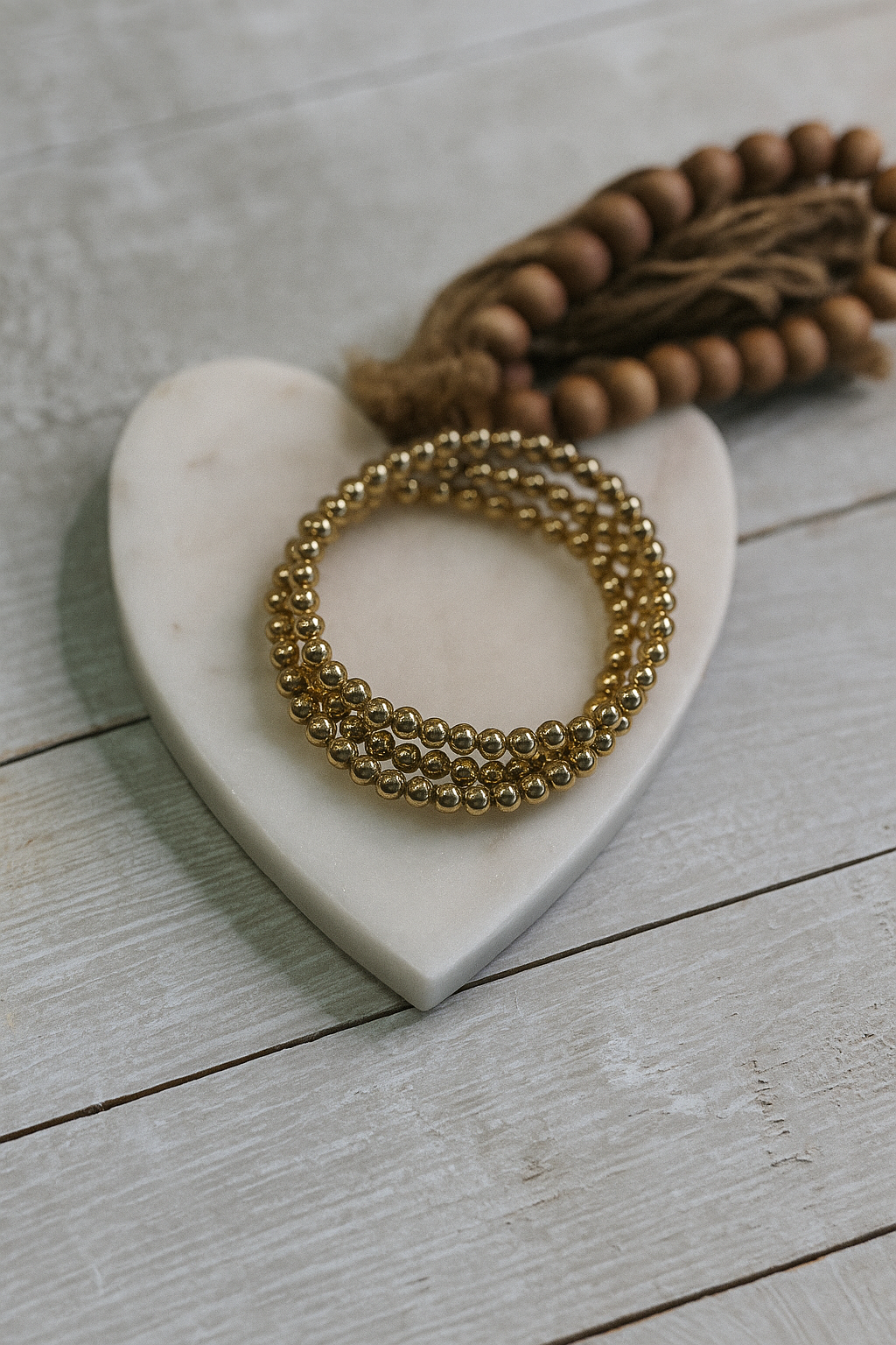 Small gold beaded bracelet set.