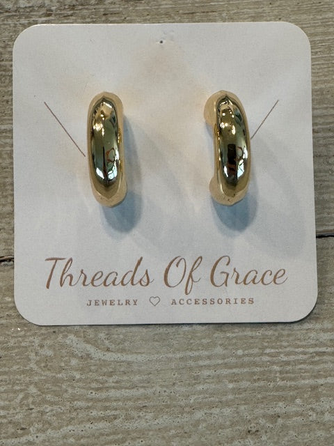 Gold tone thick hoop earrings