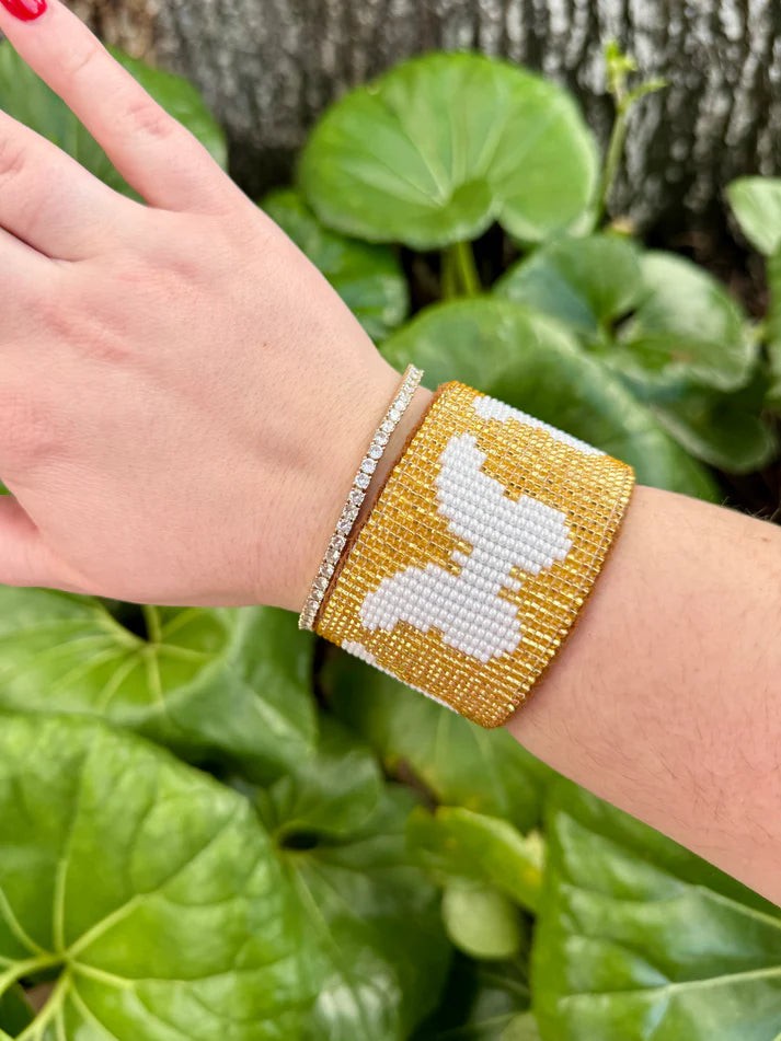 Good cuff featuring 3 white butterfly silhouettes