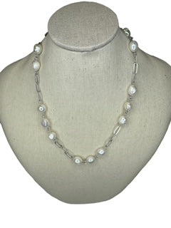 necklace features stunning pearls on a silver plated link chain