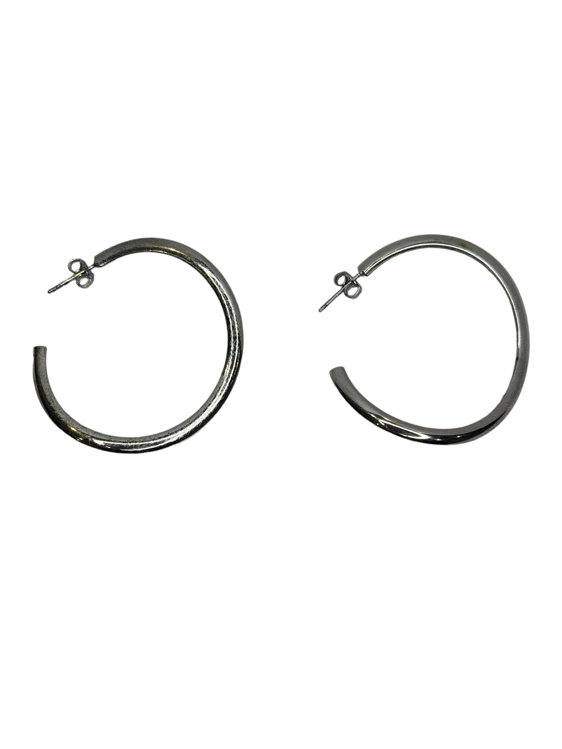 Silver curved hoops