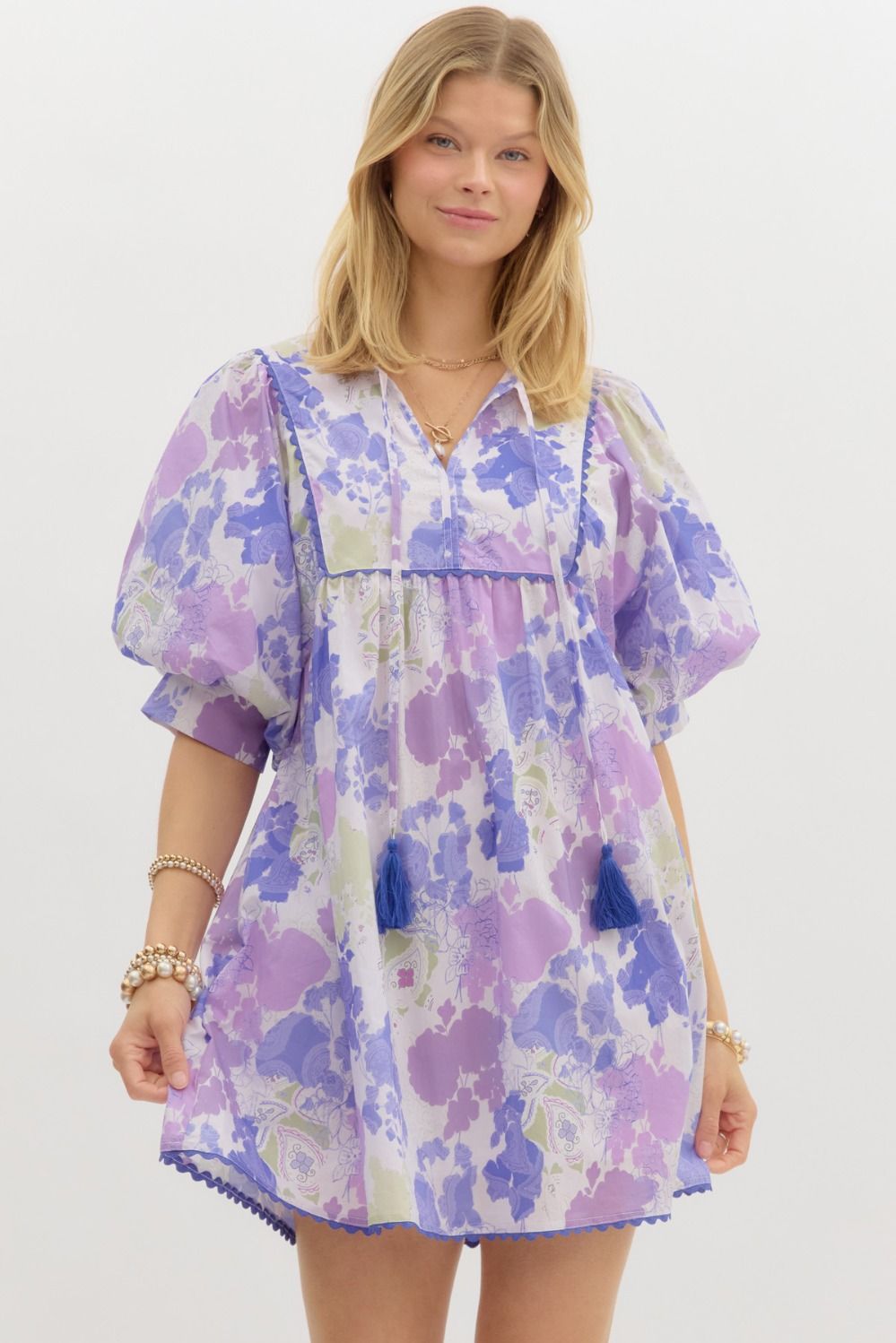 Multiple shades of purple water color print mini dress with puff sleeves.