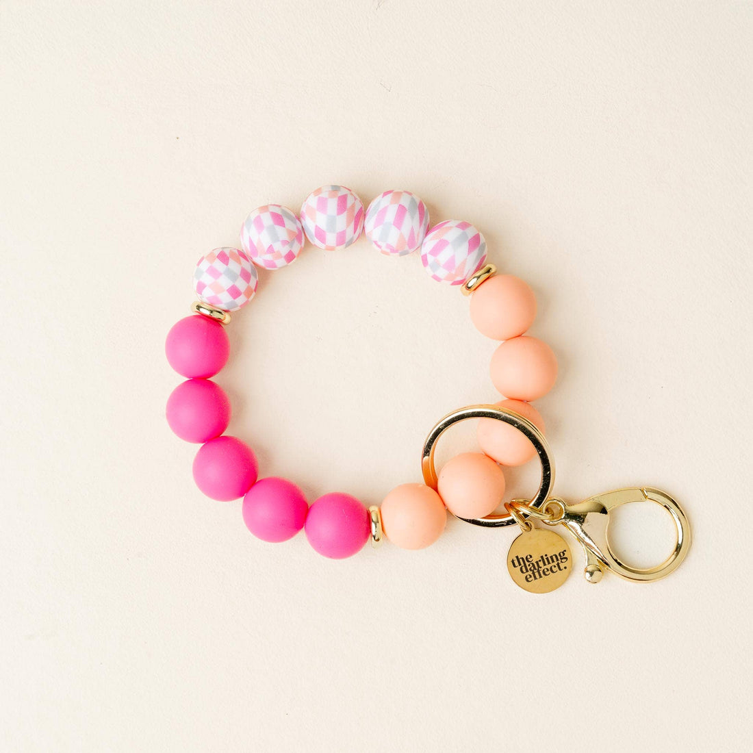Pink and checkered wristlet silicone keychain 