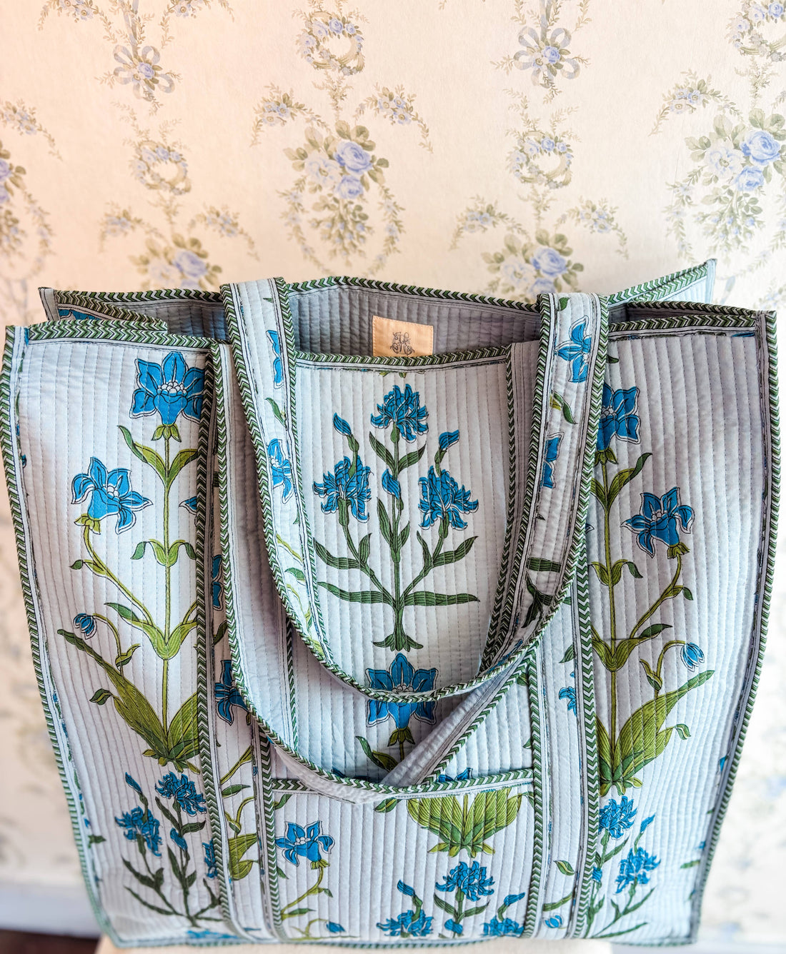 Blue floral quilted tote bag