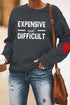 Charcoal long sleeve expensive but difficult with heart patch on elbows 