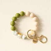 Green beige and floral wristlet keychain 