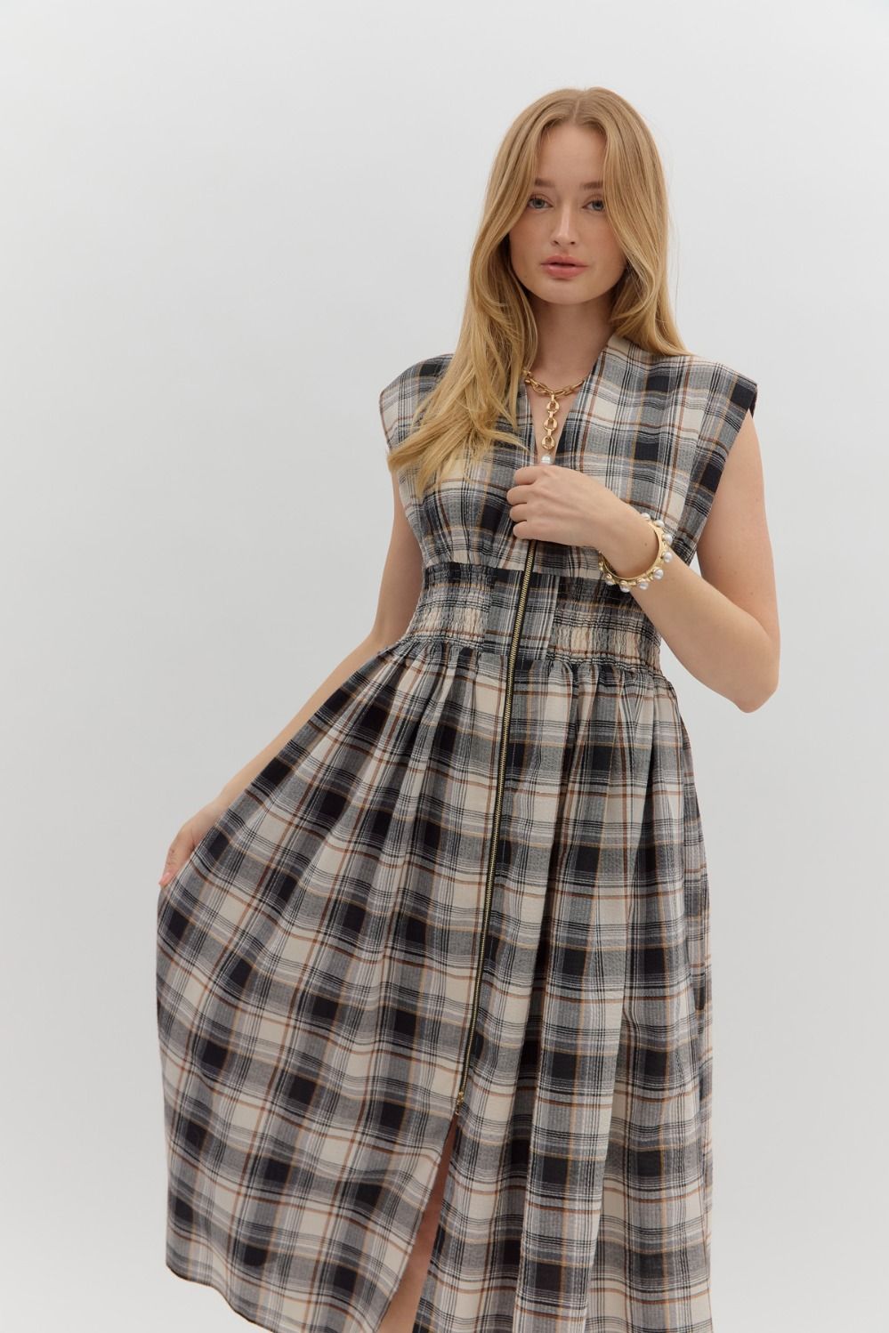 Zip up black plaid midi dress with no sleeves and pockets