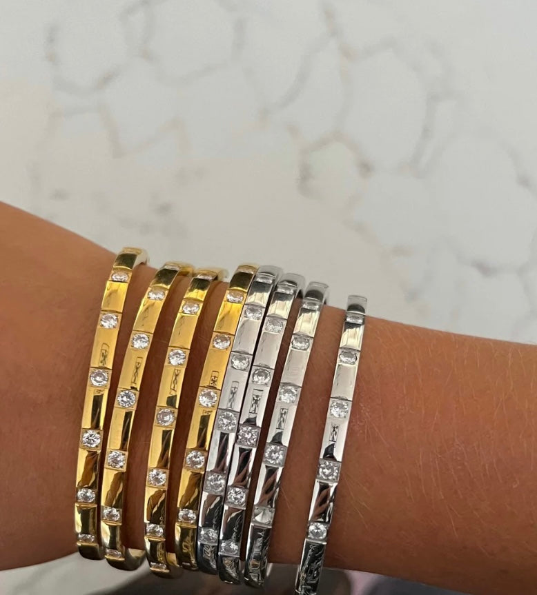 Diamond studded bracelet comes in gold and silver 
