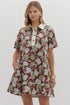 burgundy base, soft green and white floral print, and crisp ivory collar, this collared mini dress