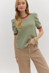 striped knit that’s anything but basic. With olive and cream stripes and bold rust red contrast trim at the collar and cuffs