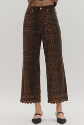 Dark Leopard print pants with trim on bottom 