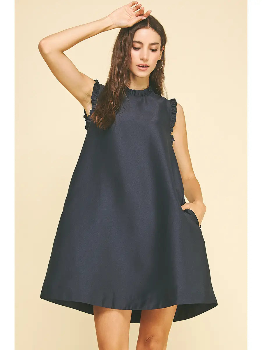 Ruffled tunic dress with ribbon detail at back 