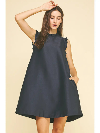 Ruffled tunic dress with ribbon detail at back 