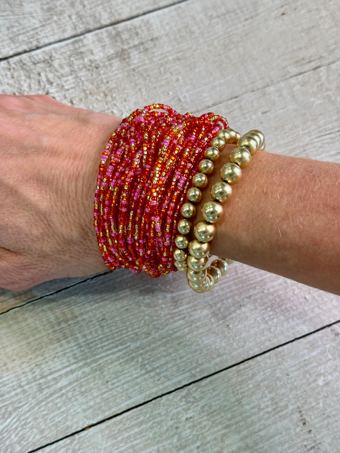 Multi Strand Pink, Red and Gold bracelet