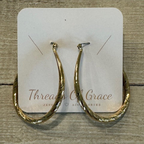 Oval shaped gold tone hoops