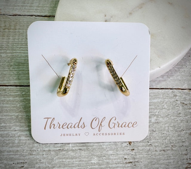 Silver lightweight post back earrings with a cool-toned twist on your favorite everyday sparkle. With their slim square silhouette and delicate CZ accent.