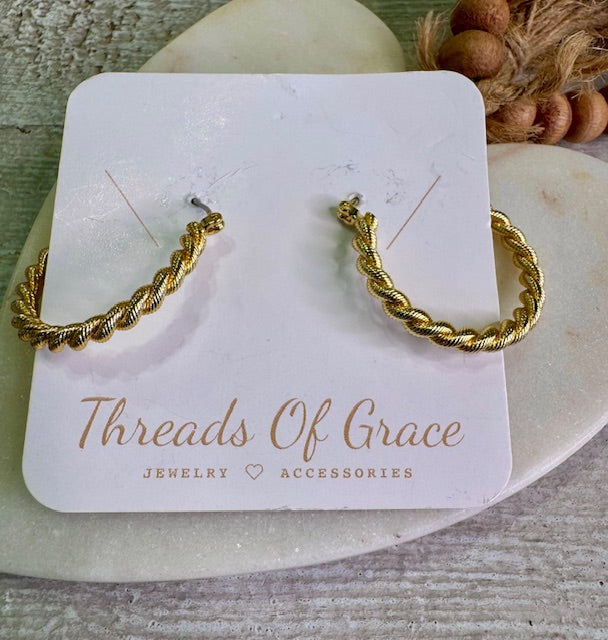 classic gold hoops—elevated. With a delicate rope texture and leverback closure.