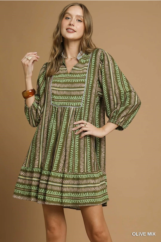 Olive green dress with mid sleeves and v neck slit at top 