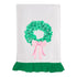 White tea towel with green sequin wreath and pink bow, finished with a green ruffle hem.